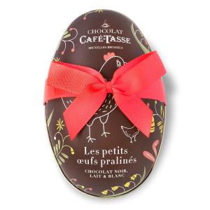 Egg tin filled with 12 assorted praline chocolate eggs.
